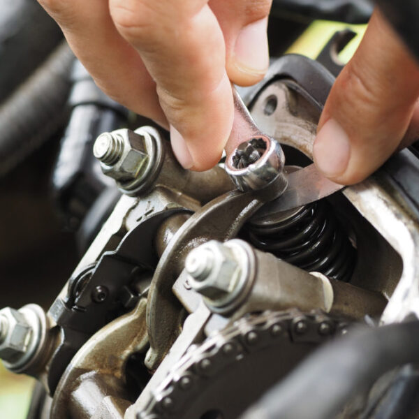 Adjusting the valves on the motor scooter. Adjusting the valves on the motor scooter.